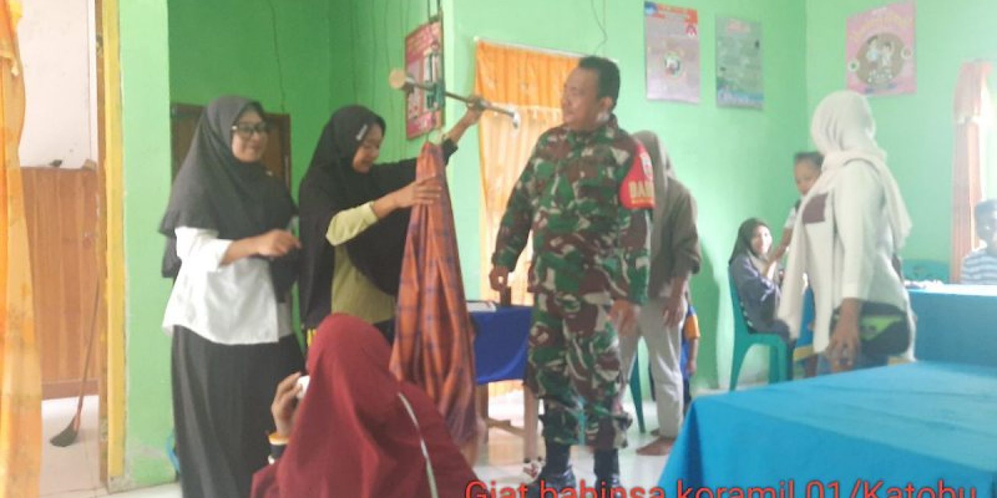 Babinsa Koramil 1416-01/Katobu Mendampingi Kegiatan Posyandu Balita