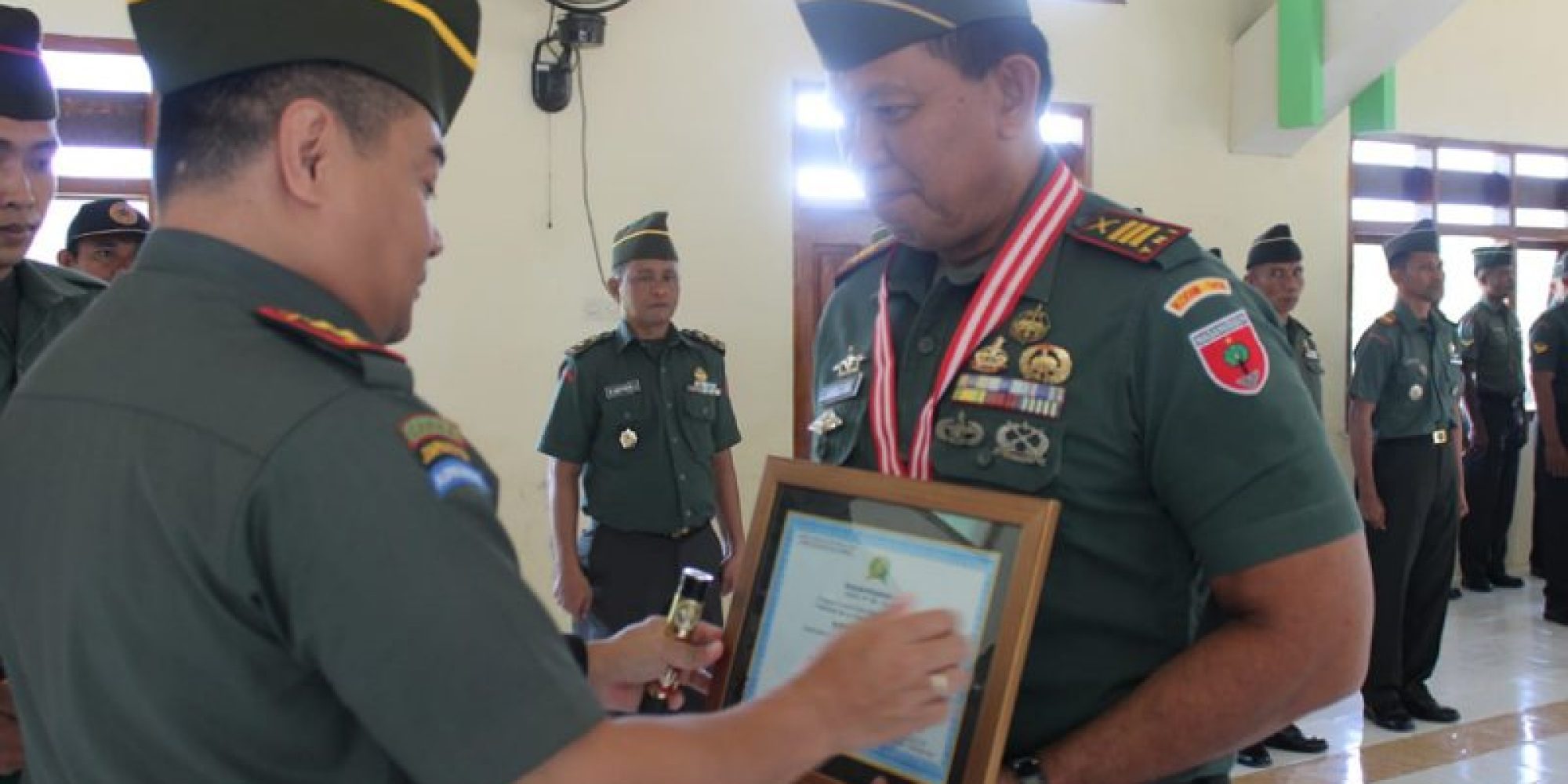 Dandim 1416/Muna Pimpin Acara Korps Raport dan Tradisi Pindah Satuan