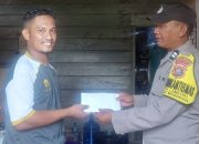 Program Polri Peduli, Polsek Watubangga Bantu Uang Tunai Kepada Korban Kebakaran
